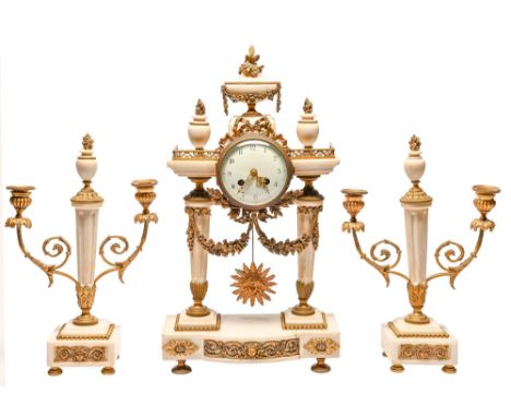 A French ormolu mounted statuary marble garniture de cheminee, late 19th c, in Louis XVI style, the colonnade clock with enam