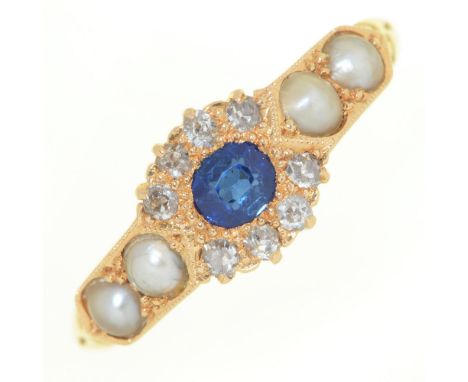 A Victorian sapphire and diamond cluster ring, with split pearl shoulders, in 18ct gold, Birmingham 1891, 3.4g, size L½ Good 