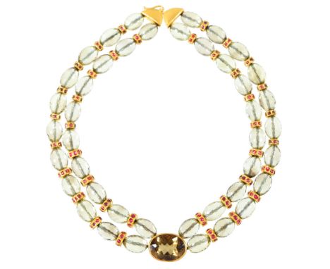 Eileen Coyne. A gem set necklace of faceted citrines with ruby spacers, in gold, 37.5cm l, signed E Coyne, marked 22ct, 132.8