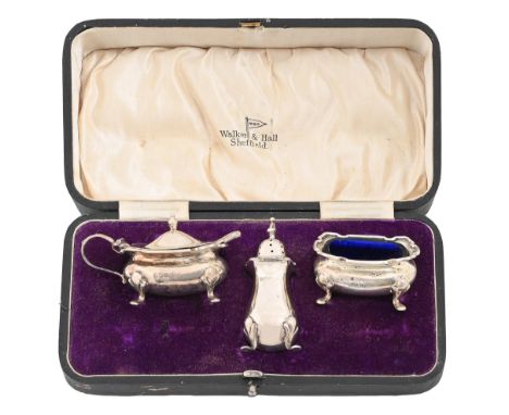 A George V three-piece silver condiment set,&nbsp; pepperette 80mm h, by Walker &amp; Hall, Sheffield 1915,&nbsp;&nbsp;cased,