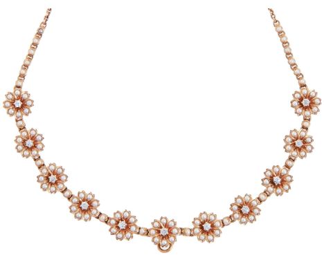 A diamond and split pearl necklet, early 20th c, the eleven flower clusters divided by single split pearls, in gold, 39cm l, 