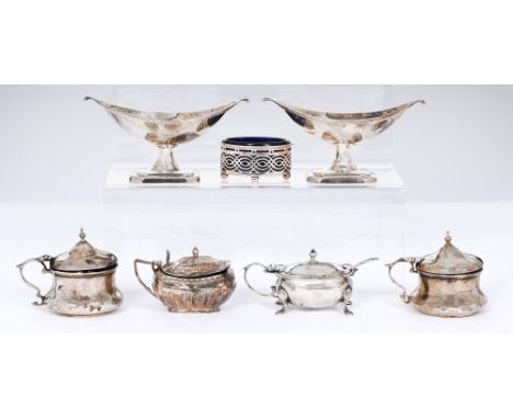 A pair of Victorian silver salt cellars, with reeded rim and scroll ends, on flared foot, 12cm l, by Thomas Bradbury &amp; So