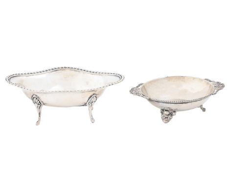 A George V silver sweetmeat dish, with beaded rim, on four legs, 12.5cm l, by The Goldsmiths and Silversmiths Co Ltd, London 