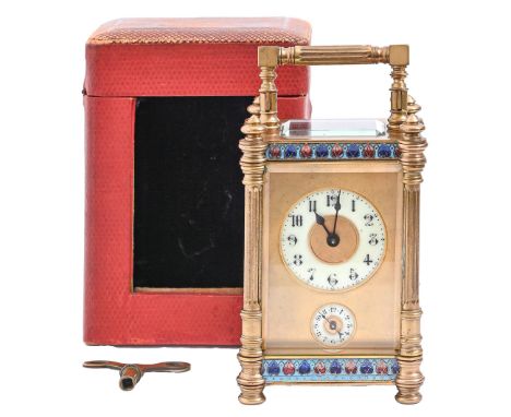 A French gilt brass and champleve enamel carriage clock, early 20th c, with primrose enamel chapter and alarm rings, in pilla