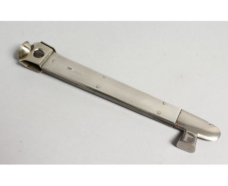 A LARGE ENGINE TURNED SILVER CIGAR CUTTER, .925, MAKER J C V , 8ins long.