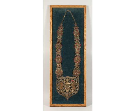 A FRAMED INDIAN GILT THREAD CHAIN OF OFFICE 'PBORGEETPOTRIA'. 3.5ins x 11.5ins.