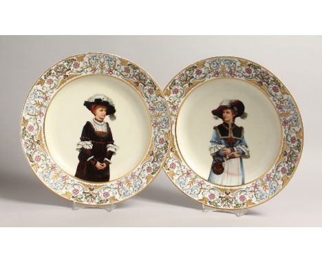 A LARGE PAIR OF AUGUSTUS REX PORTRAIT CIRCULAR DISHES, inscribed Mentalar, No. 679 &amp; 680 Mark A. R. in blue 14ins dimeter