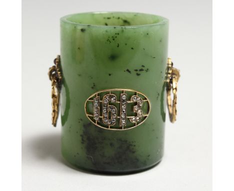 A SUPERB RUSSIAN JADE, SILVER GILT AND DIAMOND SET CUP, dated 1613, with diamonds, with Russian eagle and laurel handles. 2in