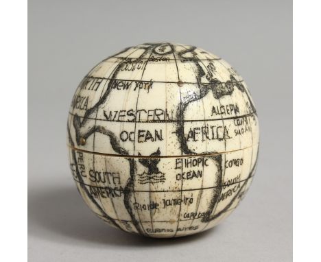 A BONE GLOBAL COMPASS 2.75ins diameter.