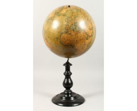 A GLOBE TERRESTRE by A. BENOITS &amp; CO. PARIS. 12ins diameter on a wooden stand.