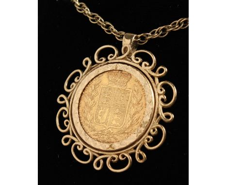 A VICTORIAN YOUNG HEAD SHIELD BACK FULL SOVEREIGN, 1845, in a mount on a chain.