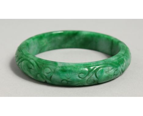 A CARVED JADE BRACELET.