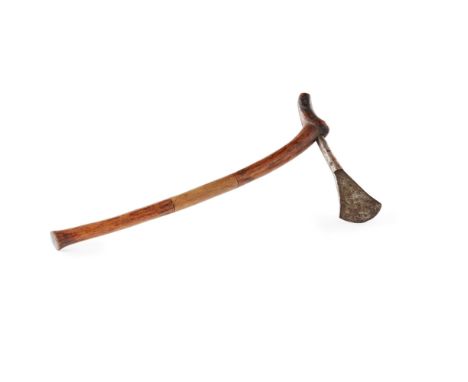 LOZI AXE  wood and trade iron, gently curving shaft, the carved section is darkened with the central section lighter, with a 