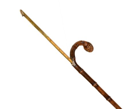 Early 20th century horse measuring walking stick or cane, the bamboo shaft with metal shoulder mount stamped 'JH Patent' encl