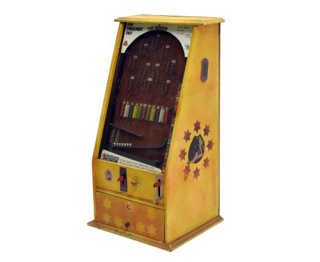 Early to mid 20th century pinball slot machine ‘The Gordon’, the wooden casing with stencilled decoration on yellow ground an