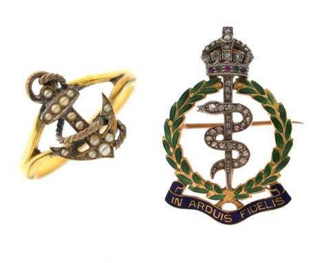 Royal Army Medical Corps, an early 20th century diamond and enamel regimental badge brooch, in the form of a green enamelled 