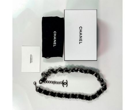 A lovely silver chained belt lined with black velvet. The Iconic Coco Chanel â€œCCâ€ designed pendent adds an elegant look to