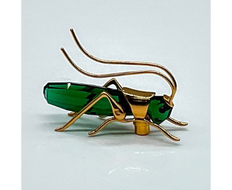 Part of the Swarovski Crystal Paradise collection. A stunning Dark Emerald crystal insect with gold plated 925 sterling silve