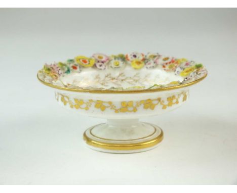 A rare Welsh porcelain tazza, attributed to Nantgarwcirca 1818-20probably London-decorated, the edge with raised flowers and 