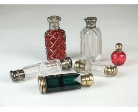 A group of six glass scent and smelling salt bottles, late 19th/early 20th centuryincluding four double-ended examples, a min