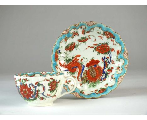 A Worcester 'Jabberwocky' teacup and saucercirca 1770of fluted form, painted in the Kakiemon-style with a dragon amongst orna