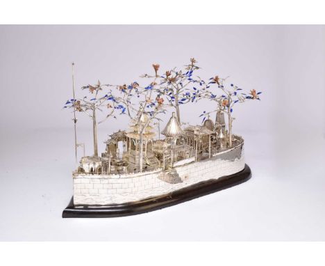 A very large and unusual Chinese enamelled silver plated and silver model of a shipBelieved 19th century, modelled as a broad