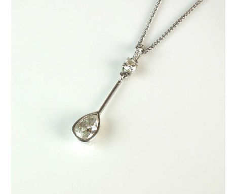 An 18ct white gold pear cut diamond pendant, designed as a single stone pear cut diamond drop, collet set to knife edge bar m