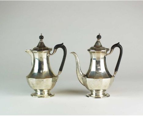 A faceted silver coffee pot and hot water jug, Elkington &amp; Co, Birmingham 1927, each with ebonised handle and finial, rai