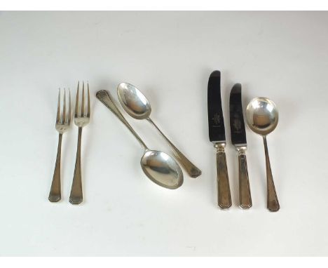 A set of Art Deco silver flatware, Mappin &amp; Webb, Sheffield 1933 &amp; 1937, comprising; twelve table forks, twelve table