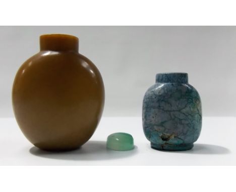 Two Chinese hardstone snuff bottles, one ovoid and of a light brown colour, the other possibly turquoise of flattened ovoid f