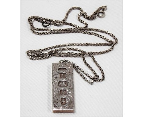 Silver 1977 hallmarked ingot and white metal chain stamped 925, weight overall 1.25oz approx.