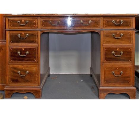 Edwardian cross banded and boxed and ebony strung twin pedestal desk, the green leather gilt tooled writing inset over an arr