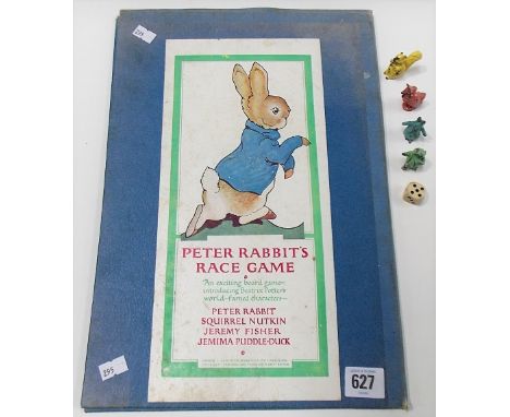 Vintage board game 'Peter Rabbit Race Game' by Frederick Warne & Co Ltd and with the four original lead game pieces