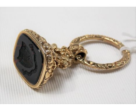 Georgian high purity gold fob seal, foliate cast, the rectangular bloodstone matrix with armorial intaglio, weight 23g approx