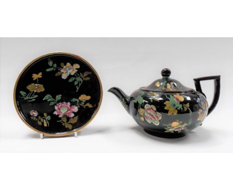 Early 19th Century Wedgwood black glazed teapot and stand, foliate enamel decorated, impressed marks (damage to spout and chi