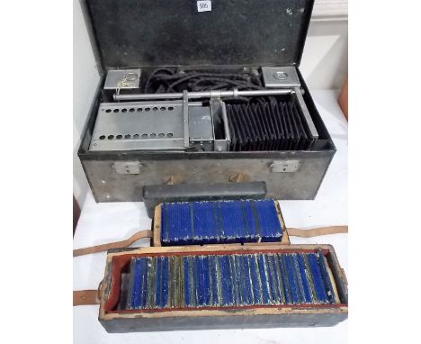 Early 20th Century magic lantern 'otoscope' together with two boxes of glass slides, mainly topographical
