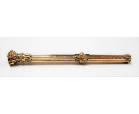 Victorian gold propelling pencil with octagonal engine turned barrel and hardstone shield-shaped seal, unmarked, length 9.5cm