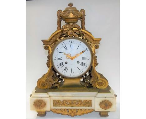 French Ormolu neo-classical style two train clock, the 6.5in white convex enamel dial painted with Roman and Arabic numerals 