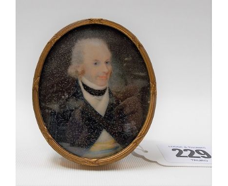 Early 19th Century British portrait miniature on ivory, half length portrait of a naval officer, oval, 6.5cm x 5.5cm, within 