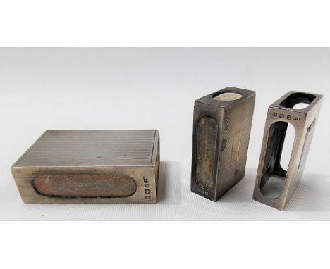 Three hallmarked silver matchbox cases, two engine turned.
