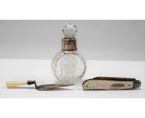 Silver miniature trowel bookmark with mother of pearl handle, Birmingham 1924; together with a miniature cut glass scent bott