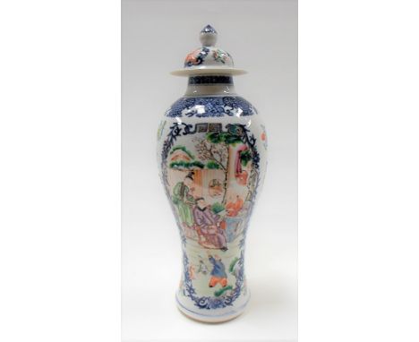 Chinese famille rose baluster lidded vase decorated with two panels of figures within a terraced garden and underglaze blue f