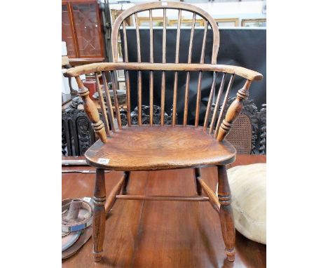 19th Century elm hoop and stick back Windsor elbow chair.