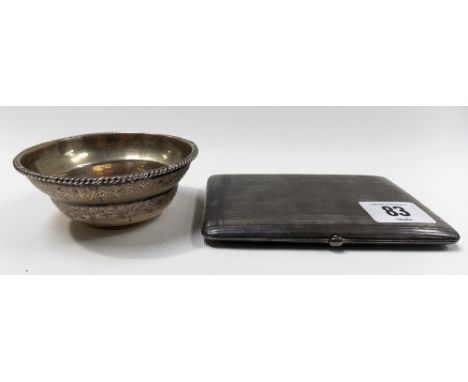 Continental white metal engine turned cigarette case, stamped 800; together with an Eastern white metal small circular dish, 