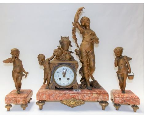 French gilt spelter and red veined marble figural clock garniture, the two train movement with 3in enamel dial, height 47.5cm