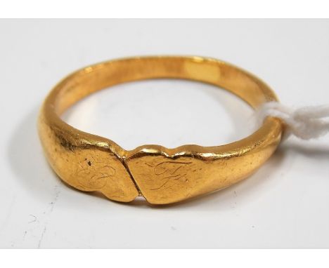 High purity gold, possibly 17th Century, ring with two opposing hearts and lightly engraved on each L and R, weight 4.4g appr