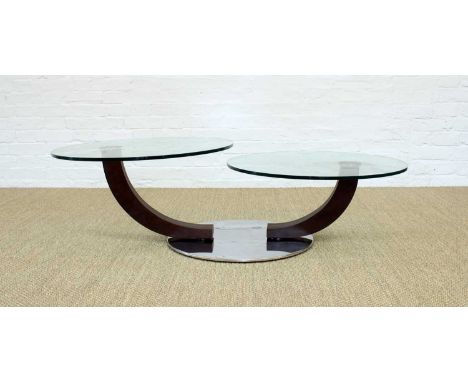 Cà Nova Design for Cattelan Italia "Inox" Coffee Table The two circular graduated glass tops on swivelling shaped supports to