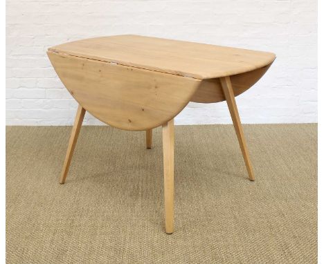 Lucian Ercolani for Ercol Model 384 "Windsor" Drop-Leaf Dining Table Circa 1960s, the shaped elm top on tapered beech support