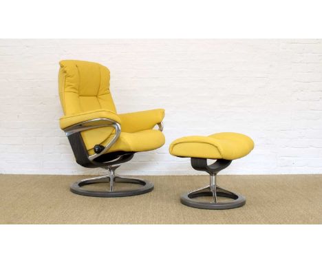 Ekornes, Norway "Stressless" Recliner and Ottoman Upholstered in yellow grained leather and raised on chromed supports to gre