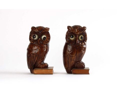 J. Oswald Co., Freiburg Near Pair of Novelty "Rolling Eye" Mantel Clocks Circa 1950s, each modelled in resin as an owl perche